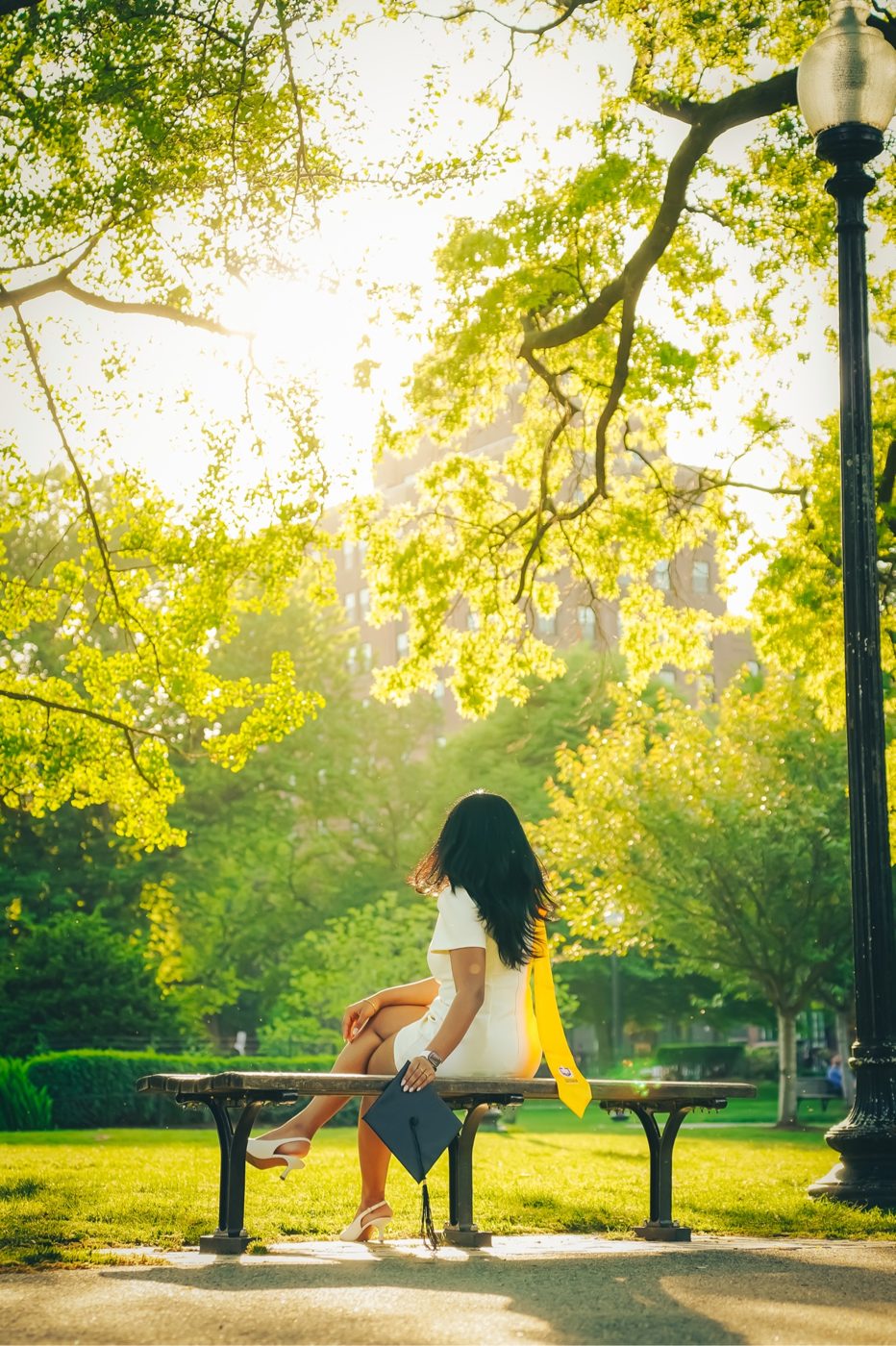 Graduation portrait on a bench