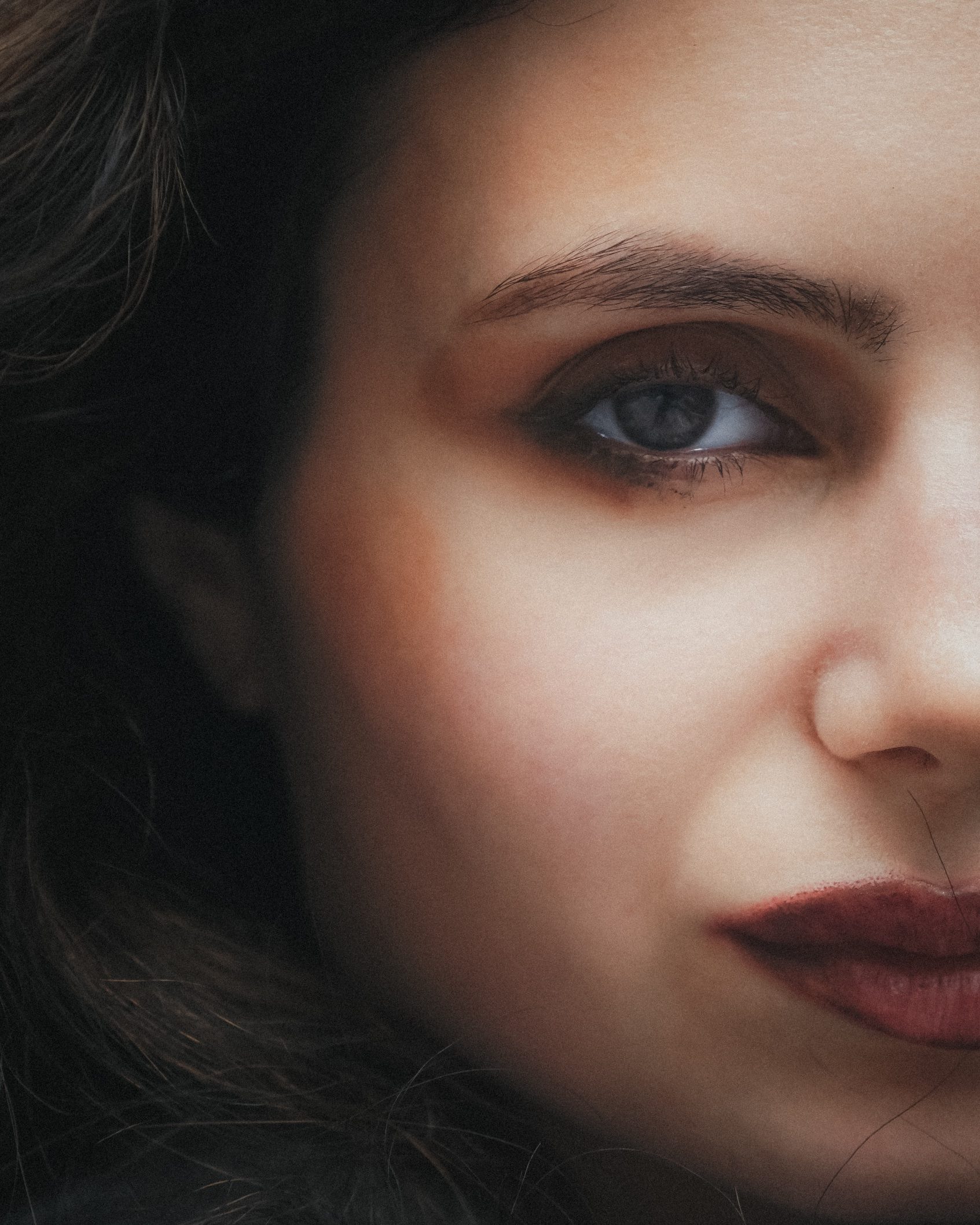 Extreme close-up — eye and lips